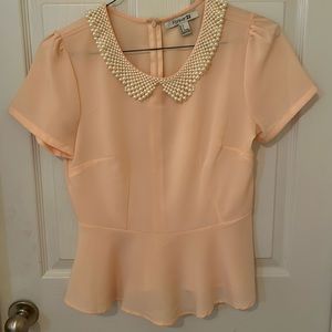 Peach peplum top with pearl collar